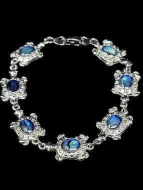 SJ "SUPREME JEWELRY" SILVER TONE WITH BLUE JEWEL SEA TURTLE BRACELET